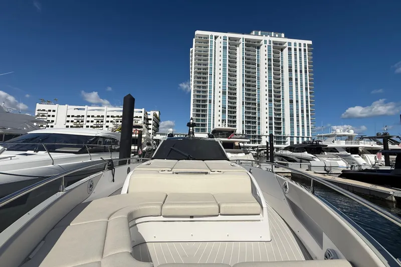 Slide: The Image of 2023 Azimut Verve 47 luxury yacht docked at marina, showcasing sleek design and modern features. - 8