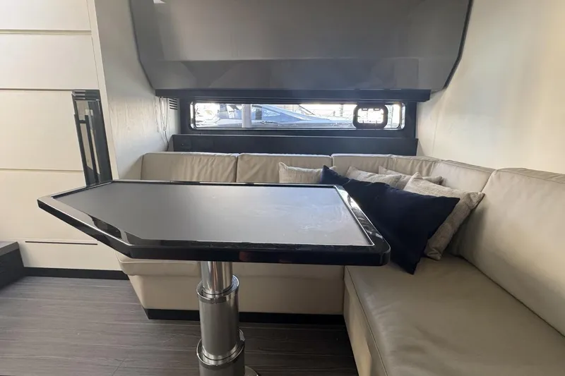 Slide: The Image of Interior of 2023 Azimut Verve 47 yacht with sleek table and comfortable seating. - 81