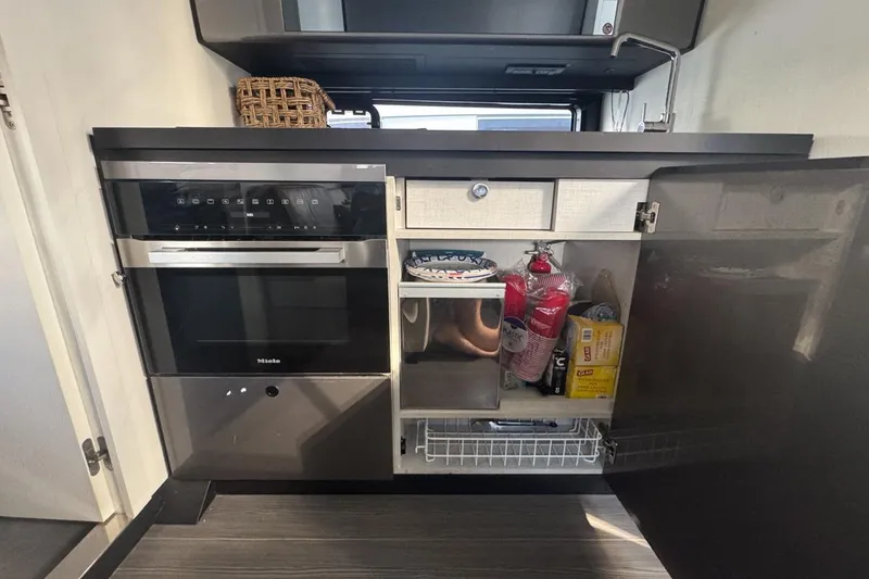 Slide: The Image of Modern kitchen area in 2023 Azimut Verve 47 yacht with Miele appliances. - 85