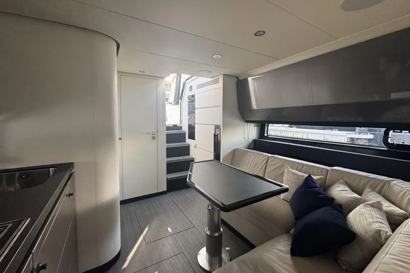 Slide: The Image of Luxurious interior of 2023 Azimut Verve 47 yacht with modern seating and sleek design. - 87