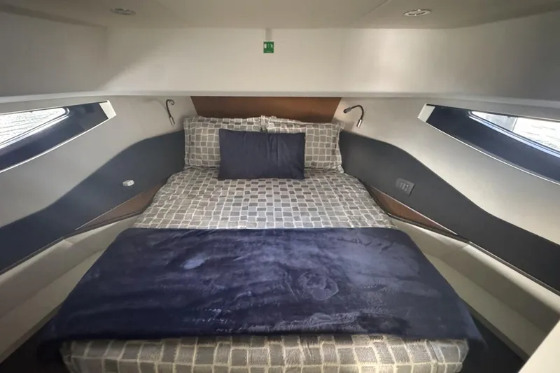 Slide: The Image of Luxurious cabin interior of 2023 Azimut Verve 47 yacht with modern bedding. - 89