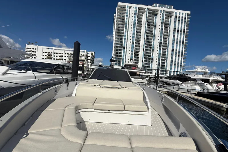 Slide: The Image of 2023 Azimut Verve 47 luxury yacht docked at marina, showcasing sleek design and modern features. - 9