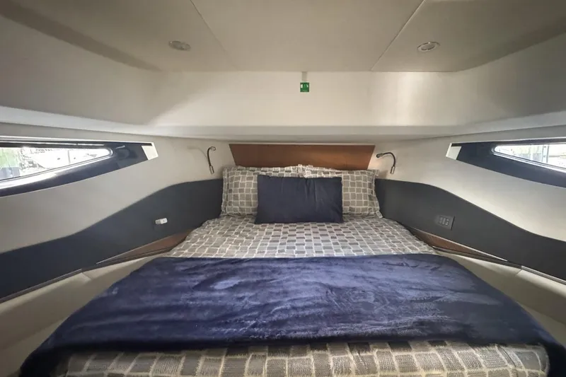 Slide: The Image of Luxurious cabin interior of 2023 Azimut Verve 47 yacht with elegant bedding. - 90