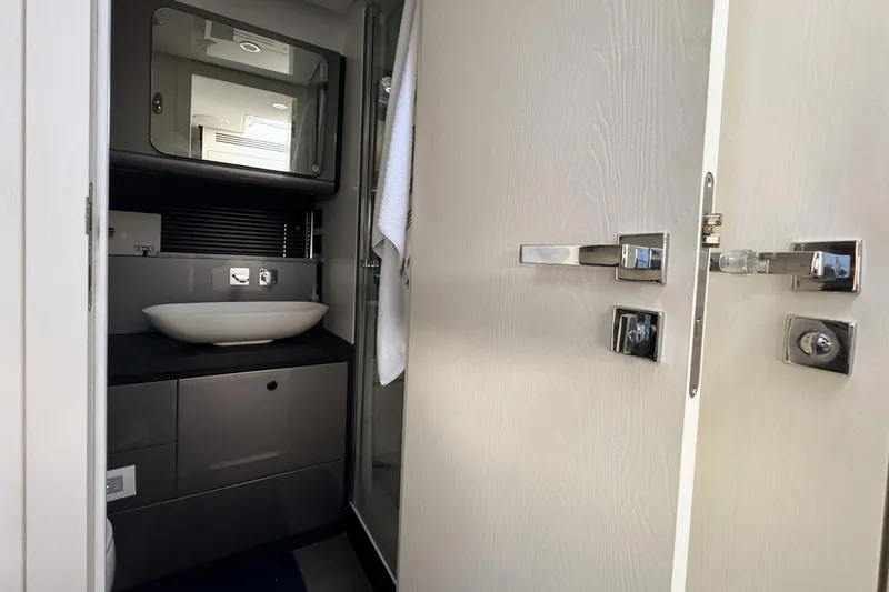 Slide: The Image of Modern bathroom interior on 2023 Azimut Verve 47 yacht, featuring sleek design and fixtures. - 98
