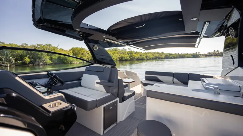 Slide: The Image of Luxurious 2021 Cruisers Yachts 38 GLS OB 450R interior with sleek seating and modern design. - 43