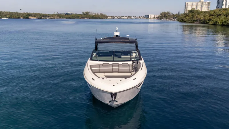Slide: The Image of 2021 Cruisers Yachts 38 GLS OB 450R on calm water, front view. - 15