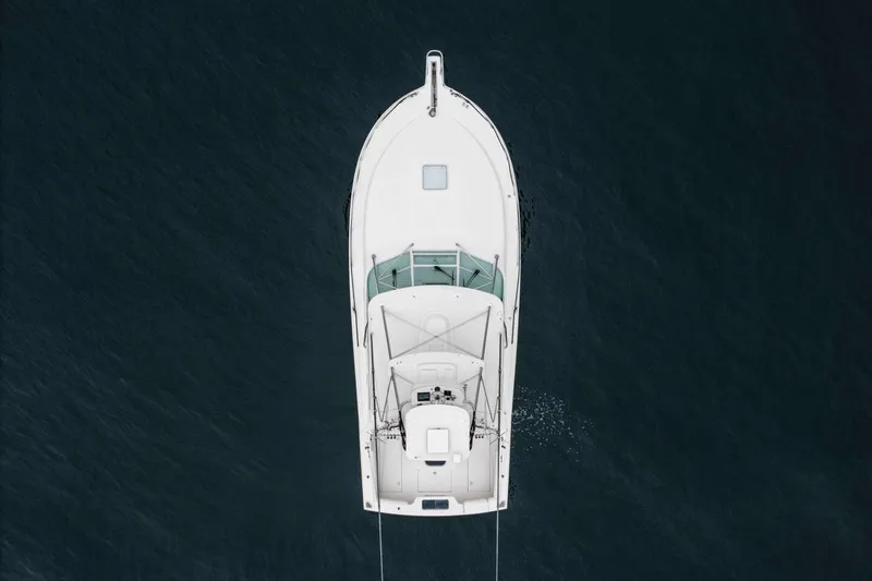 Slide: The Image of Aerial view of 2008 Cabo Yachts 38 EXPRESS on dark water. - 5