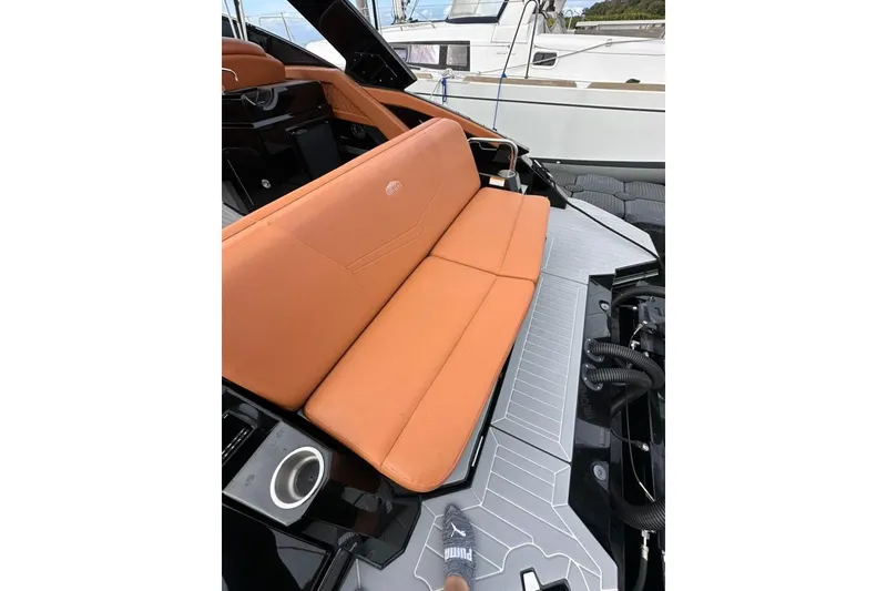 Slide: The Image of 2021 Cruisers Yachts 338 South Beach Edition Bow Rider with orange seating and sleek design. - 37