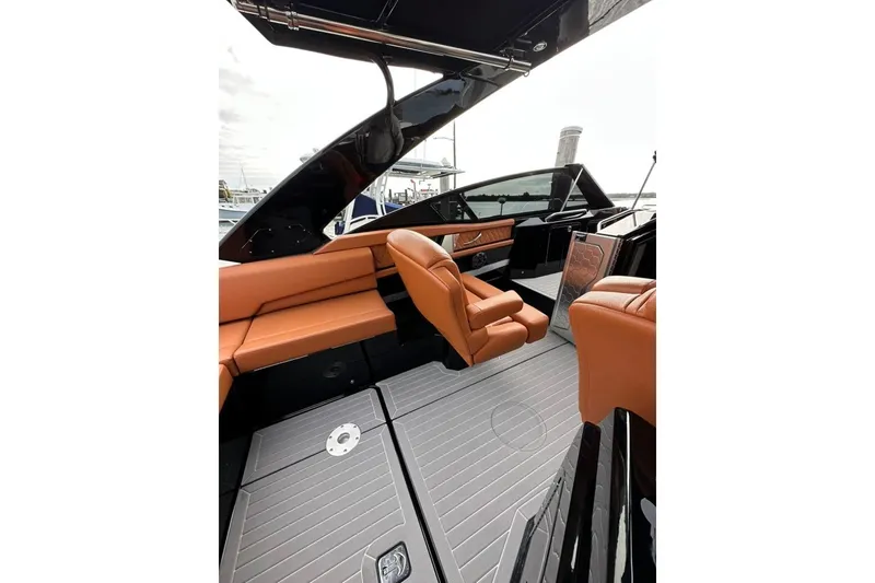 Slide: The Image of 2021 Cruisers Yachts 338 South Beach Edition Bow Rider interior with luxurious seating and sleek design. - 31