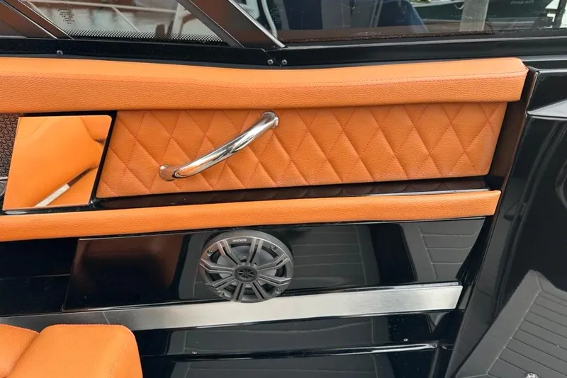 Slide: The Image of 2021 Cruisers Yachts 338 South Beach Edition interior with orange quilted leather and speaker. - 36