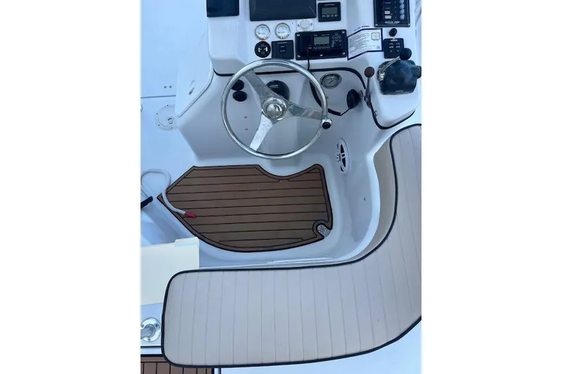 Slide: The Image of Steering console of 2015 Comercial Water Sports Ocean Pro 31 boat. - 27