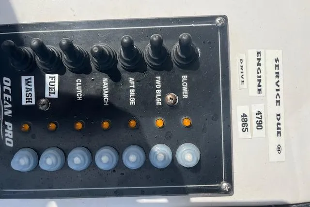 Slide: The Image of Control panel of a 2015 Comercial Water Sports Ocean Pro 31 boat. - 5