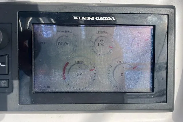 Slide: The Image of Volvo Penta display on 2015 Comercial Water Sports Ocean Pro 31 boat dashboard. - 9