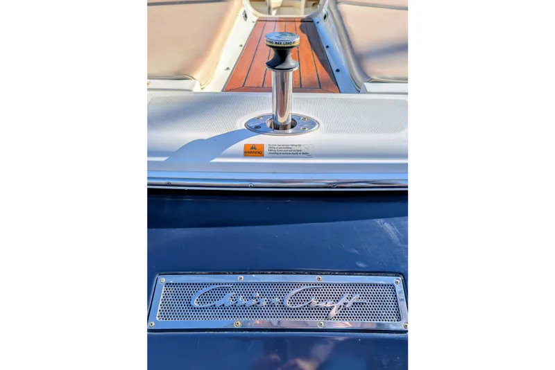 Slide: The Image of 2008 Chris-Craft Launch 25 boat deck with logo and cleat detail. - 25