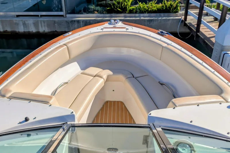 Slide: The Image of 2008 Chris-Craft Launch 25 boat with elegant seating and wooden accents. - 8