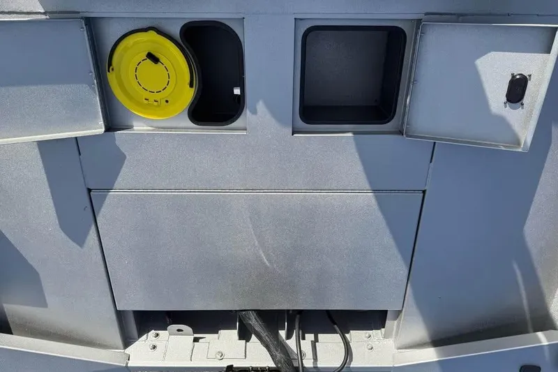 Slide: The Image of Lowe Outlet 20, 2026 model, featuring storage compartments and a yellow cap. - 15