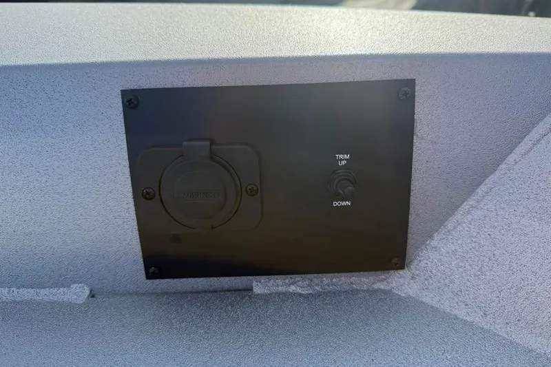 Slide: The Image of Control panel on Lowe Outlet 20, 2026 model, featuring trim adjustment switch. - 16