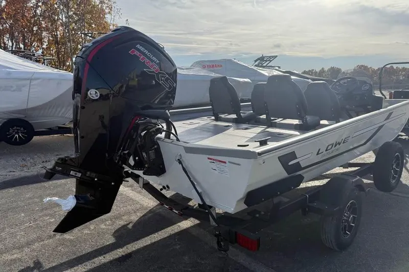 Slide: The Image of 2026 Lowe Outlet 20 boat with Mercury Pro XS engine on trailer. - 5