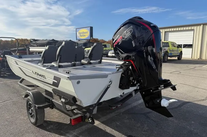Slide: The Image of 2026 Lowe Outlet 20 boat with powerful outboard motor at BlackBeard Marine dealership. - 7