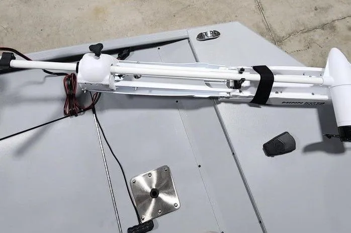 Slide: The Image of 2026 Tracker Bass Tracker Classic CC boat deck with mounted trolling motor. - 11