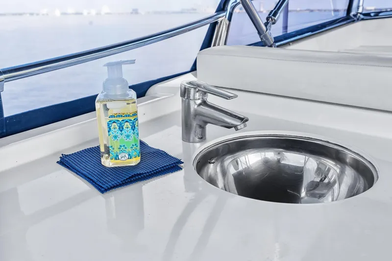 Slide: The Image of Stainless steel sink and soap dispenser on 2006 Grand Banks Europa 47 yacht deck. - 17