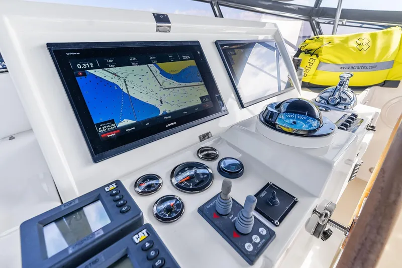 Slide: The Image of Control panel of 2006 Grand Banks Europa 47 yacht with navigation equipment and instruments. - 19