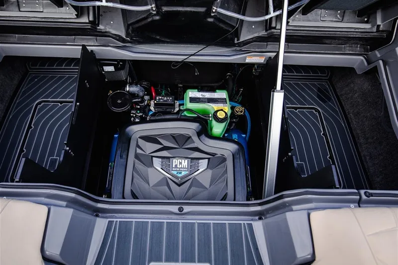 Slide: The Image of Engine compartment of 2023 Nautique Super Air Nautique G23 Paragon boat. - 13