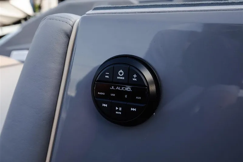 Slide: The Image of Close-up of JL Audio control panel on 2023 Nautique Super Air Nautique G23 Paragon. - 17