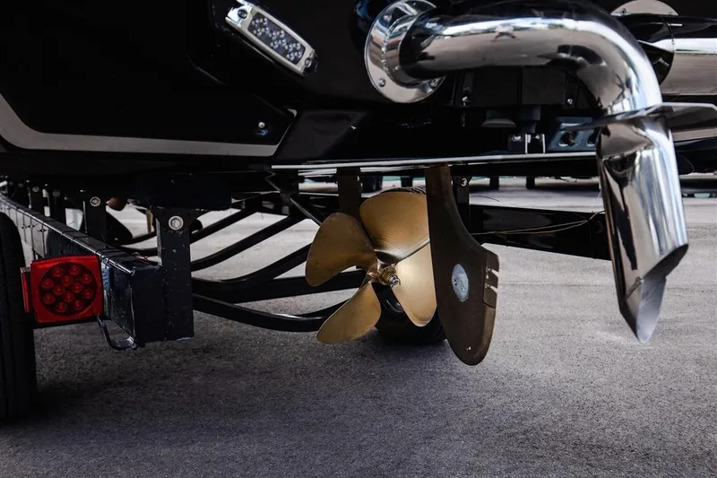 Slide: The Image of 2023 Nautique Super Air Nautique G23 Paragon propeller and exhaust detail. - 3
