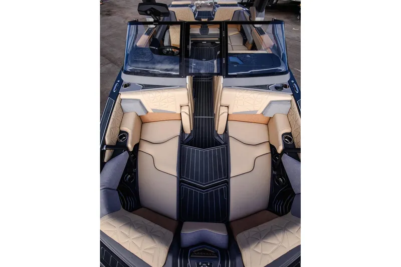 Slide: The Image of 2023 Nautique Super Air Nautique G23 Paragon interior with luxurious seating and sleek design. - 5