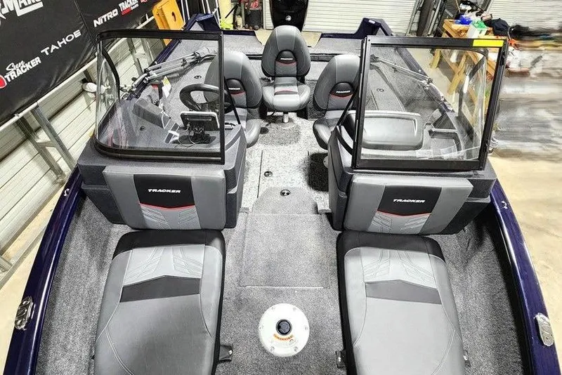 Slide: The Image of 2026 Tracker Pro Guide V-175 Combo boat interior with seating and dashboard. - 5