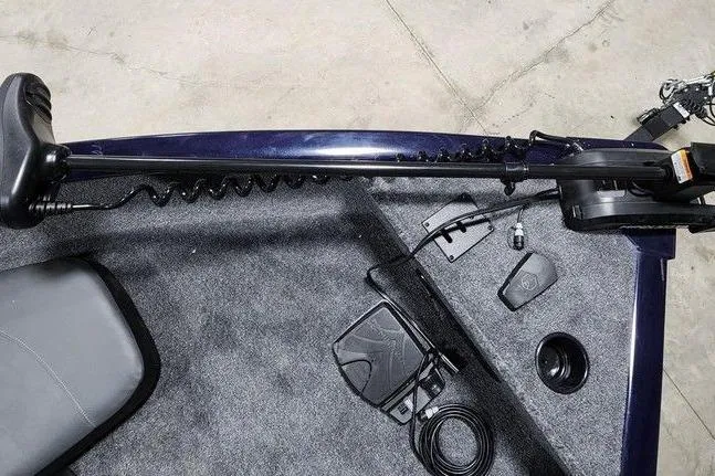 Slide: The Image of 2026 Tracker Pro Guide V-175 Combo boat interior with trolling motor and foot pedal controls. - 9