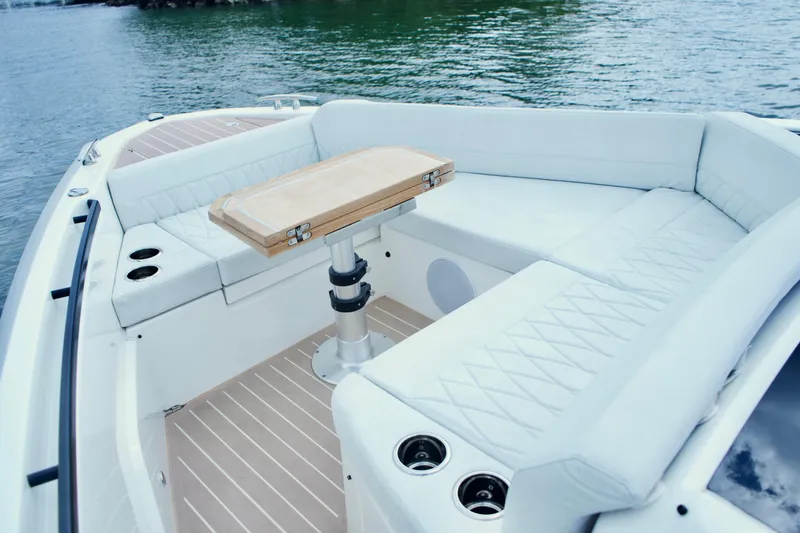 Slide: The Image of Luxurious seating area on the 2025 Saxdor 400 GTO boat with elegant design. - 24