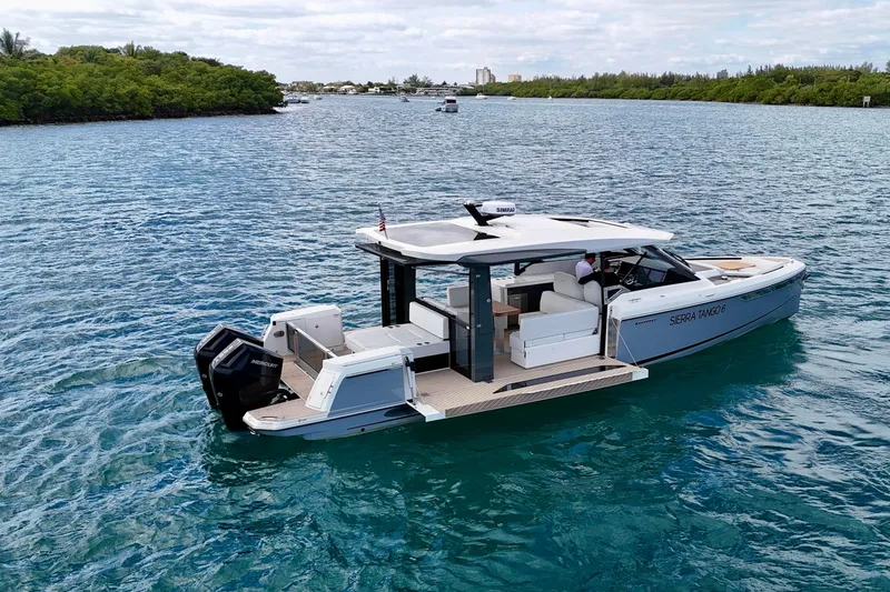 Slide: The Image of 2025 Saxdor 400 GTO luxury boat cruising on clear blue water. - 7