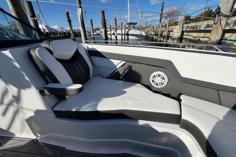 Slide: The Image of Luxurious seating on 2023 Monterey 275SS Super Sport boat at marina. - 15
