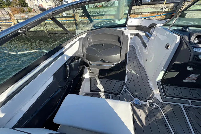 Slide: The Image of 2023 Monterey 275SS Super Sport boat interior with sleek seating and modern design. - 20