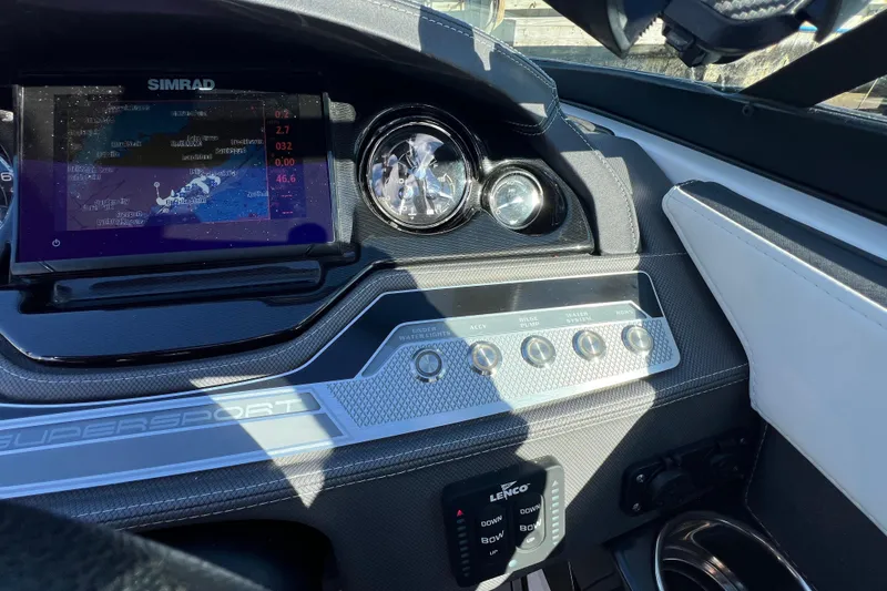 Slide: The Image of 2023 Monterey 275SS Super Sport dashboard with Simrad display and control panel. - 30