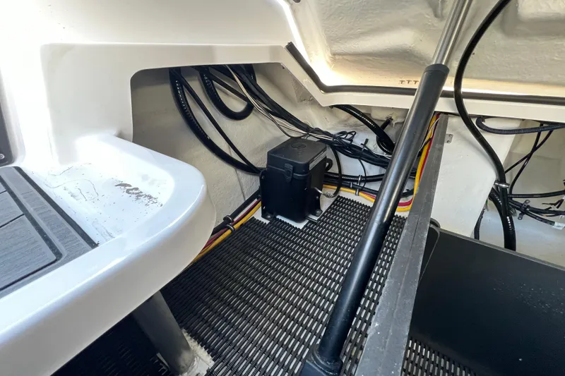 Slide: The Image of 2023 Monterey 275SS Super Sport engine compartment with wiring and components. - 36