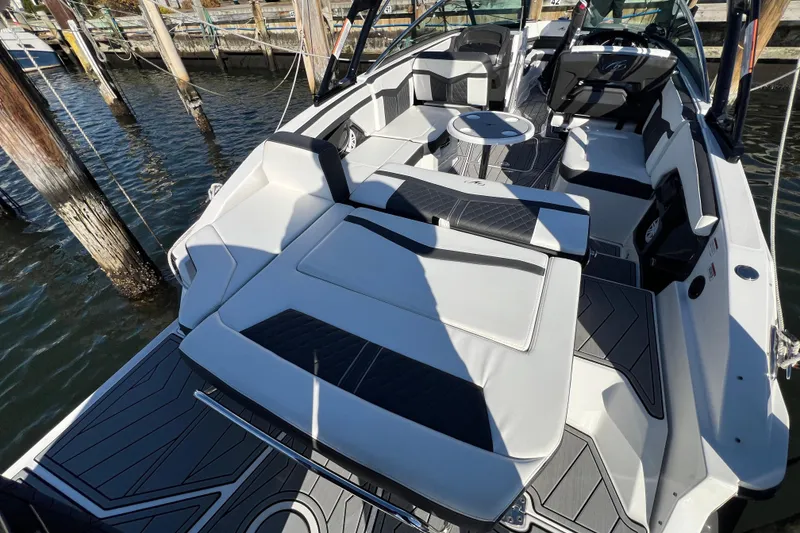 Slide: The Image of 2023 Monterey 275SS Super Sport boat interior with sleek seating and modern design. - 9