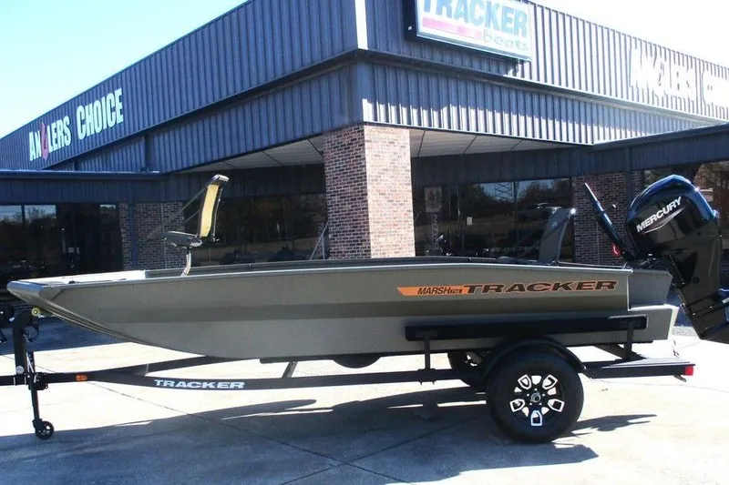 Slide: The Image of 2026 Tracker Grizzly 1756 T Marsh boat with Mercury engine on trailer. - 2