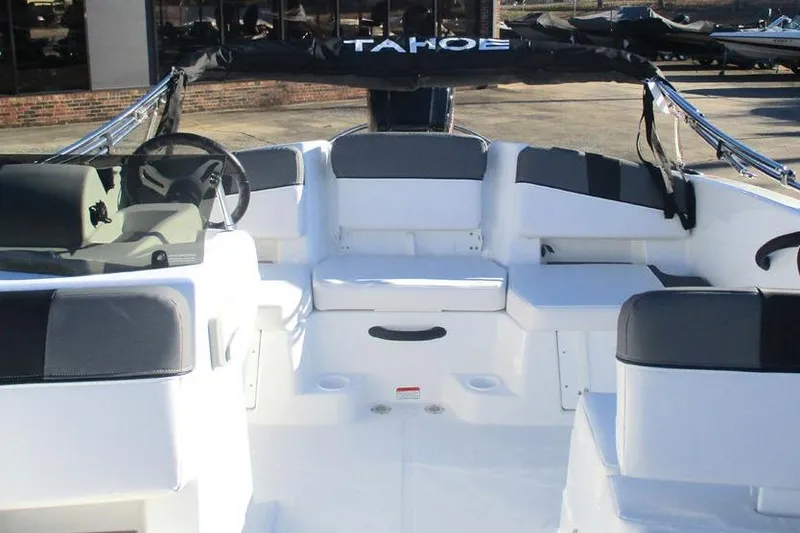 Slide: The Image of 2026 Tahoe T18 boat interior with seating and steering wheel, showcasing modern design. - 6