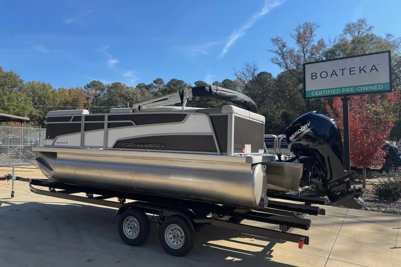 Slide: The Image of 2026 Princecraft Vectra 19 L pontoon boat on trailer at Boateka dealership. - 1