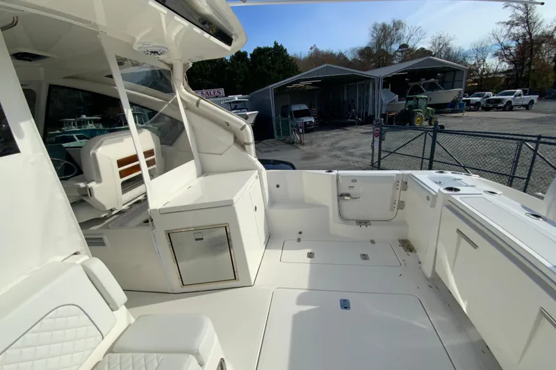 Slide: The Image of 2024 Pursuit DC 326 Dual Console boat at RT 113 Boat Sales dealership. - 13