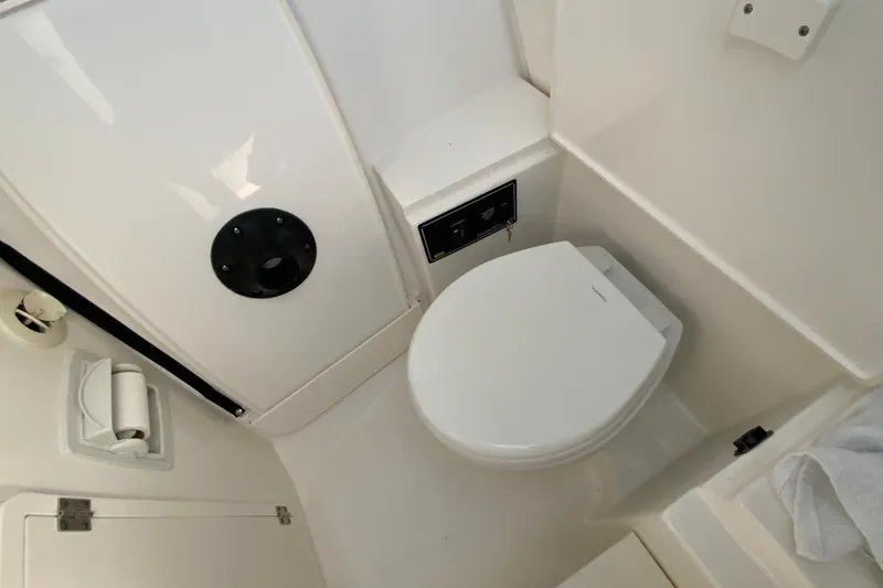 Slide: The Image of 2024 Pursuit DC 326 Dual Console interior with modern dashboard and seating. - 29