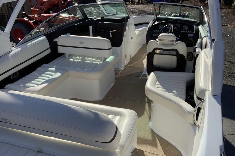 Slide: The Image of 2014 Cobalt R5 boat interior with luxurious white seating and modern dashboard. - 15
