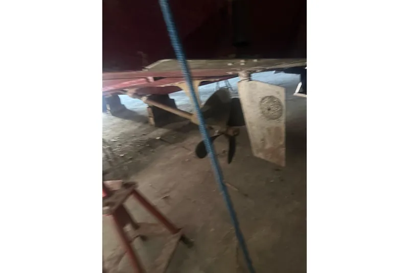 Slide: The Image of 1984 Viking 44 Motor Yacht propeller and rudder in dry dock. - 135