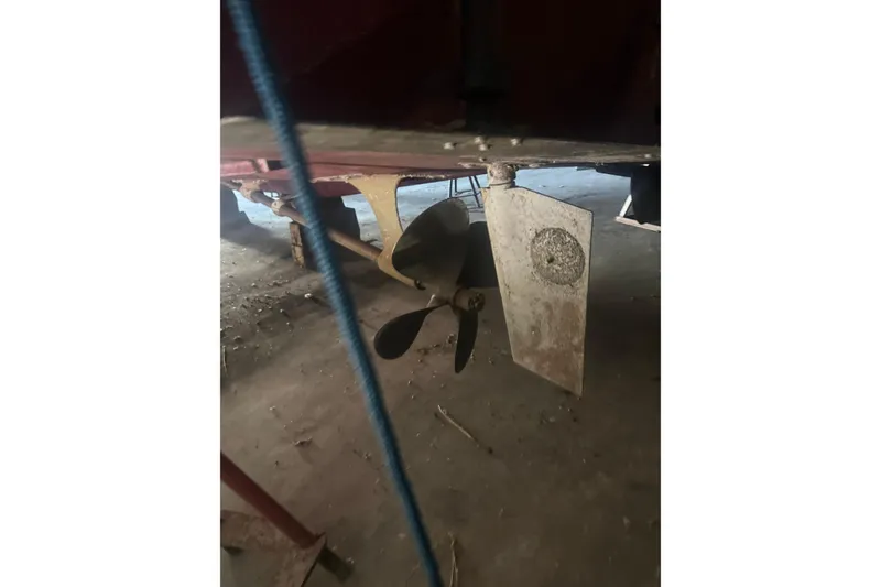 Slide: The Image of Propeller and rudder of a 1984 Viking 44 Motor Yacht in a dry dock. - 136