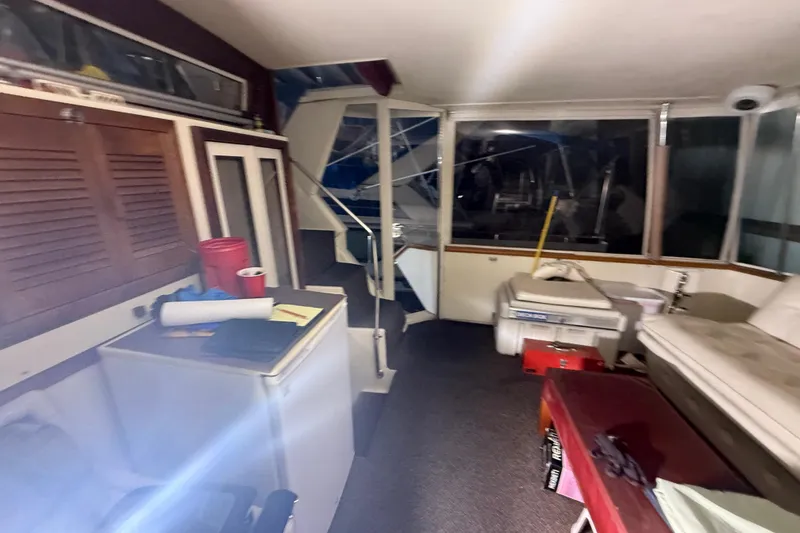 Slide: The Image of Interior of 1984 Viking 44 Motor Yacht with seating and storage areas. - 21