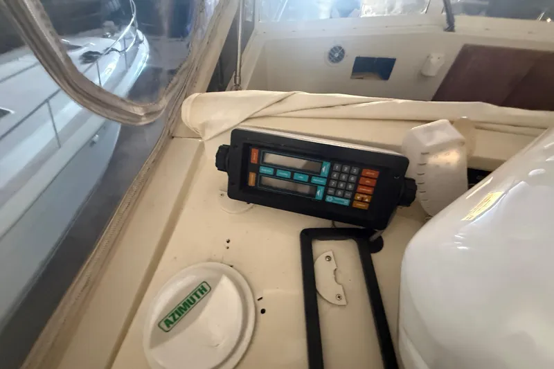 Slide: The Image of Control panel on 1984 Viking 44 Motor Yacht with Azimuth compass. - 41