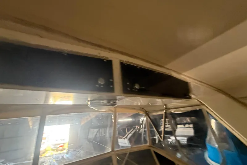 Slide: The Image of Interior view of 1984 Viking 44 Motor Yacht with windows and ceiling details. - 43